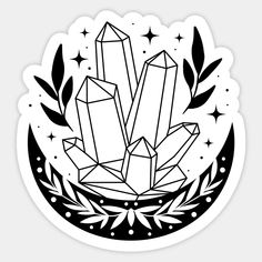 a black and white sticker with two crystals in the middle, surrounded by stars