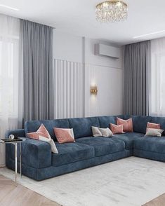 a living room with blue couches and curtains