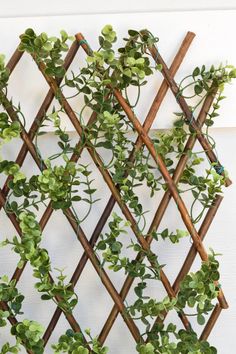 the faux boxwood lattice is an easy way to add greenery