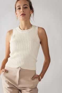 Classic ribbed knit tank. This top is a staple wardrobe item that will go with anything! Material: Viscose/Polyester Model is wearing a Small. Staple Wardrobe, Tan Top, Ribbed Tank Top, Online Clothing Boutiques, Ribbed Tank, Knit Tank, Women Clothing Boutique, Knit Tanks, Online Womens Clothing