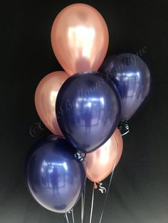 a bunch of balloons that are in the shape of a ballon on a stick