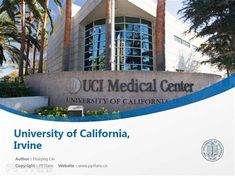 the university of california sign is shown in front of a building with palm trees around it