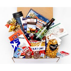 an open box filled with snacks and condiments