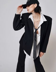 This oversized blazer features a pointed lapel, Wide-shoulder and fluid silhouette for a relaxed take on tailoring. 38% Polyester, 33% Viscose, 25% Recycled polyester, 4% Elastane. Size & Fit Size Bust(CM) Shoulder(CM) Sleeves(CM) Length(CM) S 102 48 60 71 M 106 49 61 72 L 110 50 62 73 Shipping & Return Free US shipping on orders over $100.Free International shipping on orders over $300. For more details click HERE. Spring Oversized Business Blazer, Oversized Spring Business Blazer, Chic Oversized Blazer With Suit Collar, Oversized Modern Blazer For Office, Modern Oversized Blazer For Office, Tuxedo Style Outerwear For Office In Spring, Oversized Modern Office Blazer, Modern Oversized Office Blazer, Spring Office Tuxedo Blazer