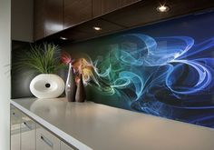 an artistic wallpaper in a modern office with vases and plants on the counter