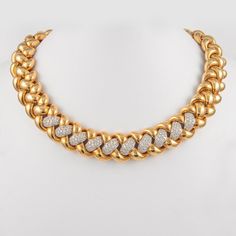 Stunning typical Retro diamond and yellow gold necklace, circa 1970's.  220 round brilliant diamonds, approximately 11 carats. Approximately G/H color grade and VS clarity grade. 18k yellow gold. Entire weight of the piece, 209.43 grams, 14in. Accommodated with an up-to-date digital appraisal by a GIA G.G. once purchased, upon request. Please contact us with any questions. Formal Round Diamond Necklace With Gold Chain, Formal Diamond Necklace With Gold Chain, Gold Diamond Necklace With Pave Setting, Anniversary Diamond Chain Necklace, Anniversary Diamond Chain Necklace With Gold Chain, Anniversary Gold Chain Diamond Necklaces, Diamond Necklace With Gold Chain For Anniversary, Anniversary Diamond Necklace With Gold Chain, Diamond Necklaces With Gold Chain For Anniversary