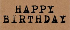 the words happy birthday written in black ink on a piece of brown paper with an erase effect