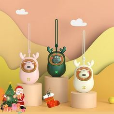 three christmas ornaments are on display in front of a backdrop