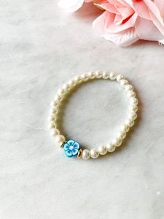 Pearl Flower Bracelet. Beaded Pearl Bracelet. Pink Flower - Etsy Adjustable Flower-shaped Pearl Bracelet, Adjustable Pearl Bracelet With Flower Shape, Adjustable Flower Pearl Bracelets, Adjustable Flower-shaped Pearl Bracelets, Blue Beaded Bracelet With Pearl Charm, Adjustable Blue Beaded Bracelet With Pearl Charm, Blue Flower Bracelet, Beaded Braclets, Gold Pearl Jewelry