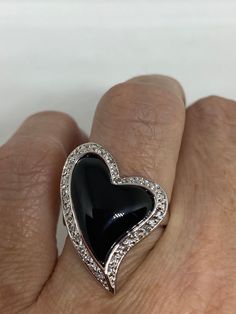 Vintage black onyx white sapphire ring 925 Sterling Silver Setting Size 6 Can be resized, my jeweler charges $10-$20 All rings are shipped free in the US in a nice gift box. Check out our over a THOUSAND great reviews Engraving is $4 per letter and is not always perfect depending on the piece. It can take a few days if the jeweler is busy. This is payable to Paypal Judithsltd@gmail.com Black Diamond Jewelry For Valentine's Day, Valentine's Day Black Diamond Jewelry, Black Sterling Silver Rings For Party, Black Ring For Valentine's Day Formal Occasion, Black Rings For Valentine's Day Formal Occasion, Black Rings For Valentine's Day Formal Events, Black Enamel Diamond Ring Perfect As A Gift, Diamond Rings With Black Enamel For Gift, Diamond Rings With Black Enamel As A Gift