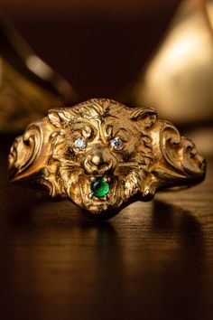 Our King of Beasts ring crafted in solid 22K gold and accented with an emerald and diamonds. 22k Gold Ring, Lion Ring, Emerald Eyes, Gold Lion, Ancient Mythology, Mens Gold Rings, Diamond Eyes, Neck Chain, 18k Gold Ring