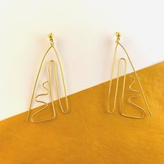 Ulta Earring - AIRI Jewelry & Gallery -Earrings Minimalist Metal Clip-on Earrings For Gift, Trendy Gold Plug Earrings For Gift, Modern Matte Gold Earrings, Trendy Wrap Earrings As Gift, Modern 14k Gold Filled Linear Earrings Gift, Trendy Metal Wrap Earrings As Gift, Minimalist Metal Plug Earrings For Everyday, Modern Gold Earrings As Gift, Modern Gold Linear Earrings For Gift