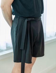 This is a Korean Modern Hanbok Summer Short Pants for Men & Women. This hanbok is modernly designed so you can wear it comfortably and beautifully. These pants have an elastic band at the back of the waist to make the waist size comfortable, and waist straps are attached to both ends of the waist to keep the feel of traditional hanbok. It is very comfortable to wear with a long rise and a wide trouser body, and it is practical with large pocket. This modern hanbok is perfect for daily and celebrations such as parties or various events. 📐Male model size Height 6.0ft(183cm) Weight 165lb(75kg) Waist circumference 32in(81.28cm) Wearing a size M pants 🟠 Decorate more stylishly with accessories that go well with Hanbok. 🟠 Go look hanbok accessories: https://www.etsy.com/shop/LunarJogak?ref=se Modern Black Belted Bottoms, Black Workwear Pants With Short Leg, Black Short Leg Pants For Work, Black Short-leg Pants For Workwear, Black Workwear Cropped Pants, Workwear Pants With Hip Pockets, Black Wide Leg Shorts With Belt Loops, Hanbok Pants, Hanbok Accessories