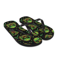 Head out in creepy style in our Creature Flip Flops! The rubber sole is lined with a soft fabric to make sure you feel comfortable wherever your day takes you. Rubber sole 100% polyester fabric lining Black Y-shaped rubber straps Toe post style PLEASE NOTE: All made-to-order products ship separately from the rest of your order. This product is made especially for you as soon as you place an order, which is why it takes us a bit longer to deliver it to you. Printing on demand is better for the en Adjustable Black Flip Flops With Rubber Sole, Casual Adjustable Sandals For Streetwear, Adjustable Casual Sandals For Streetwear, Adjustable Synthetic Slippers For Outdoor, Adjustable Non-slip Outdoor Slippers, Adjustable Synthetic Outdoor Slippers, Casual Adjustable Slippers With Rubber Sole, Adjustable Casual Flip Flops With Rubber Sole, Adjustable Non-slip Casual Flip Flops