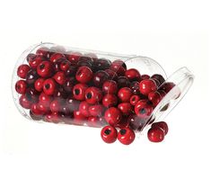 a plastic container filled with lots of red berries