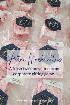 pink and blue marshmallows in plastic bags with gold foil lettering on them