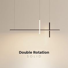 the logo for double rotation sold is displayed in front of a white wall with three lights hanging from it