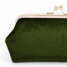 This Deep Olive Green velvet clutch is the perfect gift for at all occasions - weddings, bridal shower, bridesmaids, mother of bride, mother of groom and loved ones. Clutch details of this listing:Base Fabric: Velvet in Olive Green Lining: please choose from pull down menuHardware: 8 inch metal frame + 15 inch metal chain, both in metallic silver / gold toneDimension: approx 9 inches across, mounted on 8 inch metal frame, approx 5 inches from top to bottom.Inside: Fully padded and lined. One inn Green Clutch, Olive Green Velvet, Deep Olive Green, Emerald Green Velvet, Bridesmaid Clutches, Green Clutches, Velvet Clutch, Wedding Purse, Wedding Bag