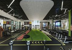 an indoor gym with treadmills and exercise equipment