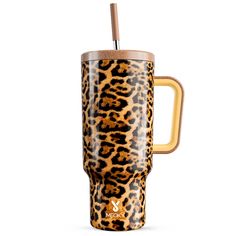 the leopard print travel mug has a straw in it