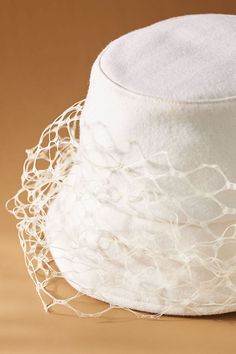 Prepare to say I do with this bridal hat adorned with a birdcage veil for an added air of elegance. | Yuki Birdcage Bridal Hat by Eugenia Kim in White, Women's, Wool at Anthropologie Hat Veil, Headband Vintage, Bridal Hat, Birdcage Veil, Eugenia Kim, White Hat, Bridal Veil, Bird Cage, Bedding Shop