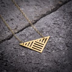 Geometric necklace, triangle necklace, triangular #jewelry #necklace @EtsyMktgTool #geometricnecklace #geometricpendant #trianglenecklace Modern Gold Geometric Necklace, Gold Geometric Minimalist Necklace, Minimalist Gold Geometric Necklace, Modern Triangle Jewelry For Gift, Minimalist Geometric Gold Necklace, Minimalist Geometric Necklaces For Everyday, Gold Triangle Necklace For Gift, Minimalist Pyramid-shaped Jewelry For Gifts, Triangle Jewelry