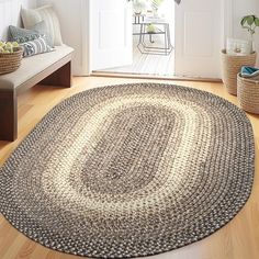 a living room area with a rug on the floor