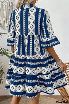 Olivia Mark - Vibrant Blue Geometric Print Ruffled V Neck Women's Dress Blue Bohemian Dress With Geometric Pattern, Blue Dress With Geometric Pattern For Vacation, Blue Printed A-line Mini Dress, Printed A-line Blue Mini Dress, Blue A-line Mini Dress With Print, Blue Bohemian Shift Mini Dress, Blue Printed Shift Mini Dress, Spring Mini Dress With Geometric Pattern, Spring Geometric Mini Dress