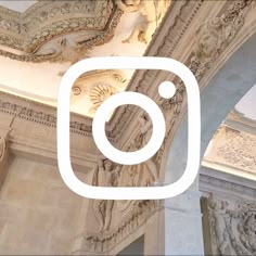 the instagram logo is displayed on top of an ornate building with columns and arches