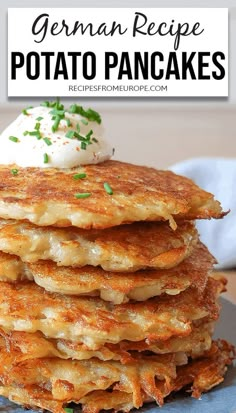 a stack of pancakes topped with whipped cream and chives