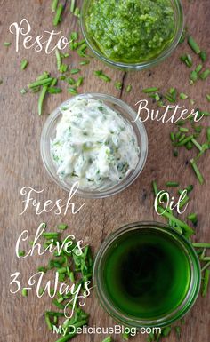 the ingredients for pesto butter, fresh chives and olives in small bowls