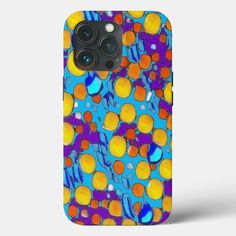 an iphone case with colorful circles and dots in blue, orange, yellow and purple