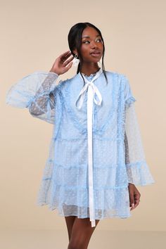 Helping you look especially sweet is what the Sister Jane Dusty Hearts Light Blue Lace Ruffled Mini Dress is an expert in! Sheer mesh fabric, with a darling heart motif throughout, shapes this swing-style, loose-fit dress that emanates whimsical vibes. Sheer long sleeves with drop shoulders and frilly flaring cuffs frame a functional partial button placket (with matching faux pearl heart-shaped buttons) and a collarless neckline, complete with a white satin necktie. Feminine ruffled trim through Ruffled Mini Dress, Sister Jane, Tiered Mini Skirt, Heart Motif, Concert Outfits, Pearl Heart, Jane Dress, Loose Fitting Dresses, Ruffle Mini Dress