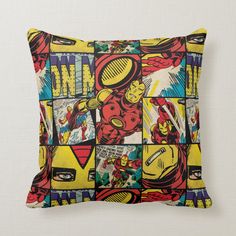 a pillow with comics on it and the words iron man in different colors, sizes and shapes