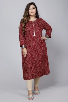 About: Upgrade your wardrobe with our Maroon Color Bandhini Print Women's Plus Size Kurti. ,This stunning piece features a bold maroon color and intricate bandhini print, perfect for making a statement. Made with the highest quality materials, our kurti offers both style and comfort for plus size women. Add a touch of elegance to any outfit with this versatile piece. Chest Size: Medium: 38 Inches Large: 40 Inches X-Large: 42 Inches XX-Large: 44 Inches XXX-Large: 46 Inches FABRIC: Cotton Sleeve t Plus Size Kurti Designs, Kurta Pajama Men, Sequence Blouse, Indo Western Gown, Saree Petticoat, Full Sleeve Blouse, Saree Jewellery, Lehenga Skirt, A Line Kurta