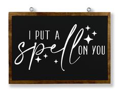 a black and white sign that says i put a spell on you with stars in the background