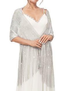 PRICES MAY VARY. Silver shawl is made of polyester. The combination of sparkling metal threads and delicate fringe is very eye-catching. 1920s shawl wrap approx size:200*70cm/78.7*27.6IN (including tassels) and comes with a free crystal buckle. Light weight and easy to carry. Wedding accessories for brides come in many colors. You can choose the right color according to your preference or clothing style. Occasions:There are many ways to wear shawls. It is the perfect match for the dress. Fashion Bridal Capelet, Wedding Scarf, Shrug For Dresses, Silver Silk, Sparkle Wedding, Sleeveless Gown, Scarf Dress, Gold Silk, Women Shawl