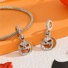 2/$20 Bundle To Save Pumpkin Bracelet Charm Drop Pumpkin Hanging, Charm Only, New Charm Only Add To Bracelet Or Keychains Halloween Pumpkin Jack O Lantern Spooky Season Accessories Charm Bracelets Silver Halloween Charms Jewelry, Halloween Silver Charm Jewelry, Silver Halloween Jewelry With Charms, Nickel-free Silver Jewelry For Halloween, Halloween Silver Round Jewelry, Silver Round Jewelry For Halloween, Halloween-themed Round Silver Jewelry, Silver Halloween Jewelry, Silver Rope Bracelet