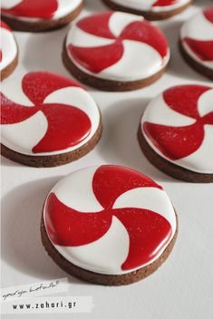 cookies with red and white icing on them