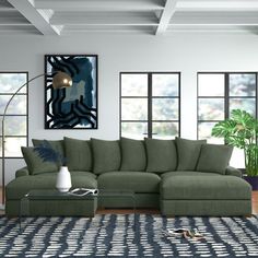 a living room with a large sectional couch