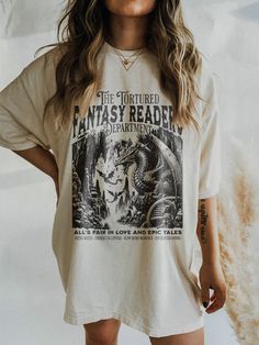 ✺ THE TORTURED FANTASY READERS DEPARTMENT  GRAPHIC SHIRT  ✺ Get this trendy Comfort Colors graphic tee. * Q U I C K F A C T S * This design is a unique, one-of-a-kind awesome illustration that has been created in house. ✺ 100% Cotton (fiber content may vary for different colors) ✺ Classic fit ✺ Sizing is unisex so runs like men's, though not overly large ✺ Most women find their typical size works best, since they are meant to fit a touch loose This is a Unisex T-Shirt which you can use as an Ove Booktok Merch, Oversized T Shirt Dress, Embroidered Tee, Love Shirt, Book Lovers Gifts, Book Lover, Tee Design, Graphic Shirts, Etsy Australia