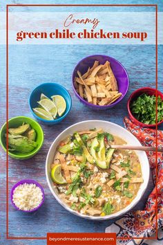 a bowl of green chile chicken soup with limes and cilantro