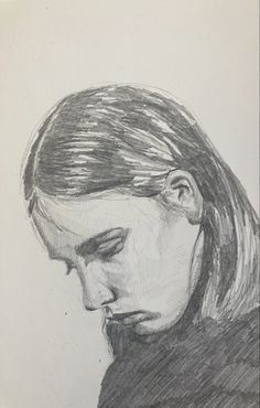 a pencil drawing of a woman's face with her hair pulled back to the side