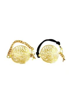 Beautiful gold-plated bracelet with Arabic calligraphy design. Bracelet is made of 22kt gold-plated over brass with either gold chain or suede. 7 inches long. Calligraphy says "God the Most Compassionate & Most Merciful". Clasp is a hook and bracelet is adjustable. Gold Chain Bracelet With Adjustable Chain For Spiritual Wear, Traditional Engraved Chain Bracelet For Gift, Traditional Engraved Chain Bracelet Gift, Gift Brass Bracelets With Gold Clasp, Adjustable Engraved Gold-plated Bracelets, Adjustable Gold Name Bracelet Engraved, Adjustable Gold Bracelet For Ceremonial Occasions, Symbolic Gold Bracelets For Ceremonial Occasions, Symbolic Gold Bracelets For Ceremonies