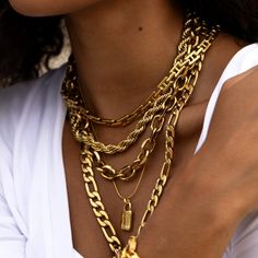 A trendy chunky link chain to elevate your stack. Chunky Link Necklace Length: 17" plus a 2" extension chain attached Width: 11mm Material: Stainless Steel Plating: 18k real gold Necklace is 100% nickel-free and cadmium-free Necklace is hypoallergenic and tarnish resistant Trendy Chunky Link Chain Necklace, Trendy Jewelry With Chunky Chain And Rectangular Links, Trendy Chunky Chain Necklace With Rectangular Links, Everyday Chunky Chain Link Charm Necklaces, Trendy Chunky Chain Link Jewelry, Trendy Gold Chain Link Charm Necklace, Trendy Gold Charm Necklaces With Cable Chain, Trendy Figaro Chain Link Jewelry, Trendy Gold Charm Necklace With Chunky Chain