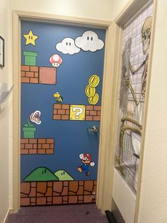 a door decorated to look like mario's house with video game characters on it