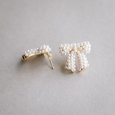 what we love about these earrings: •cutest chunky bow shape •gold filled base and posts •white pearls all over Bow Earrings, Gold Plated Silver, Earring Necklace, Pearl White, Bag Sale, Ear Cuff, Gold Filled, Silver Plate, Polymer Clay