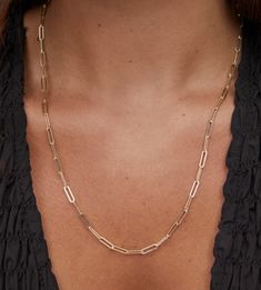 Everyone is looking for the ideal layering chain, and the Courtney Paperclip Necklace in Gold is just that. Its trendy link design complements both delicate necklaces and larger statement pieces perfectly, making chic styling easier than ever. Map Bag, Tailgate Gear, Delicate Necklaces, Paperclip Necklace, Bath And Body Shop, Link Design, Belt Purse, Delicate Necklace, Engraved Rings