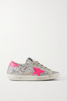 EXCLUSIVE AT NET-A-PORTER. Sure to spark joy, Golden Goose's shimmering 'Superstar' sneakers are made from leather saturated in silver glitter. They're accented with flashes of neon-pink and deliberately distressed for that signature love-worn look. Golden Goose Superstar, Goose Sneakers, Goose Shoes, Shoe Wishlist, Golden Goose Sneakers, Stockholm Style, Golden Goose Shoes