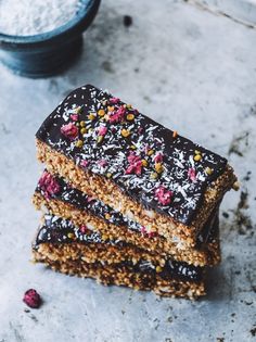 three pieces of chocolate and cranberry granola bars